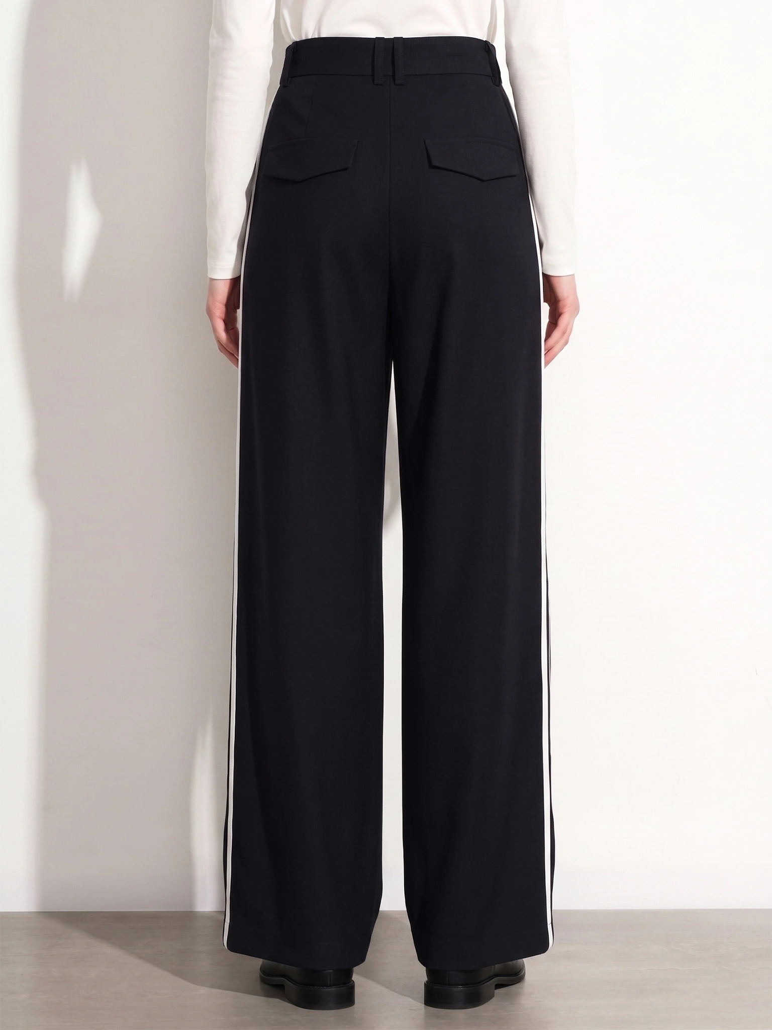 Брюки-палаццо темно-синего цвета с лампасами